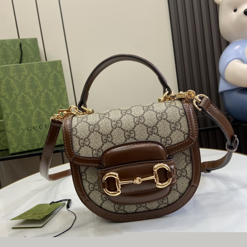 G*u*i top handle bags